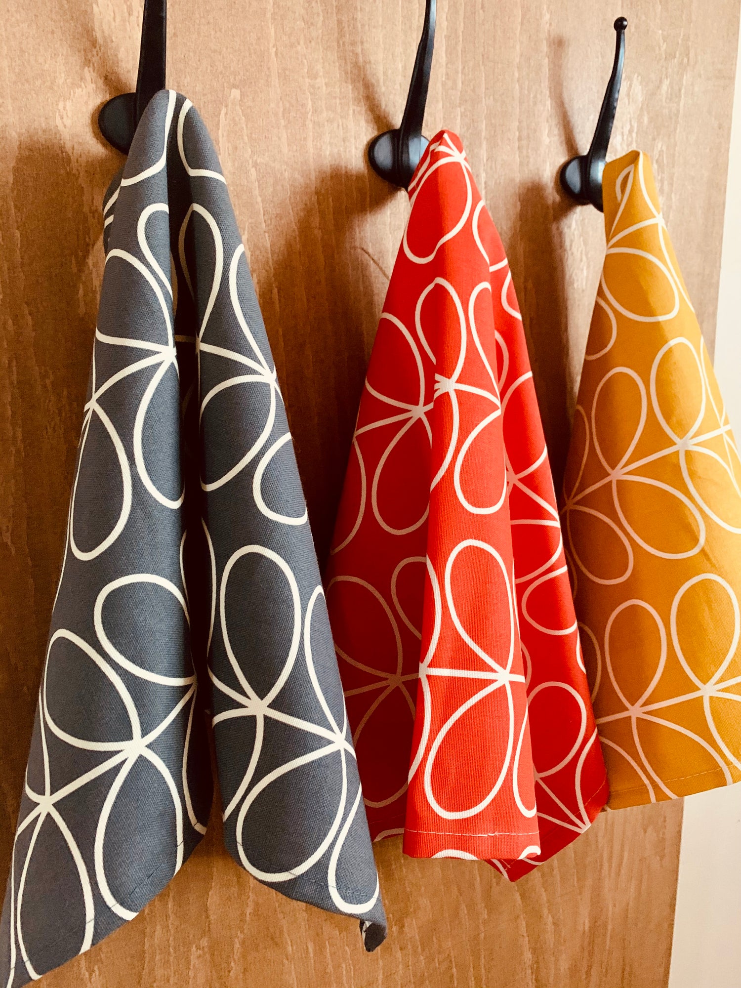 Orla kiely linear stem kitchen tea towels set of three in grey, red and yellow 