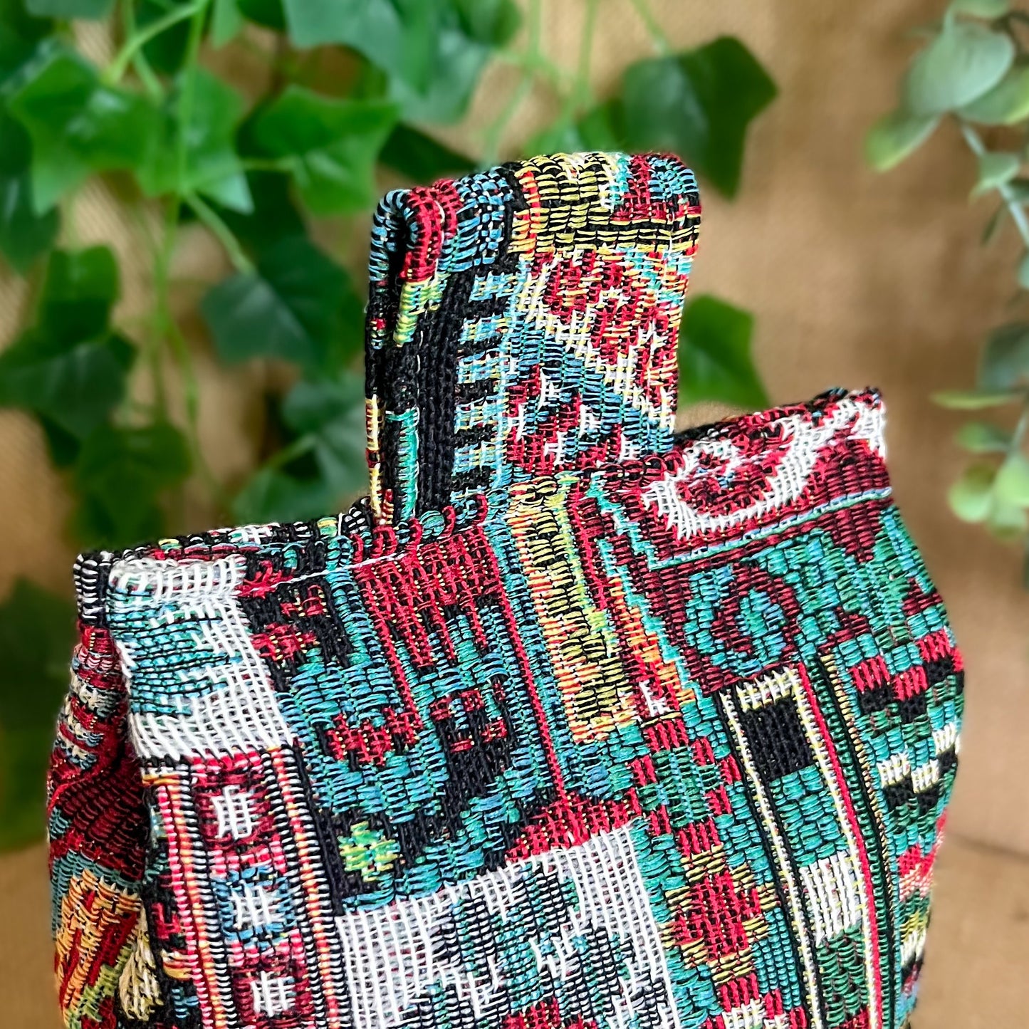 Handcrafted large Moroccan-inspired wheat-filled door stop, crafted from durable tapestry fabric in vibrant red & blue rustic hues. Measures 22cm tall x 15cm x 7cm at the base. Perfect gift available filled or with Velcro closing to fill at home.