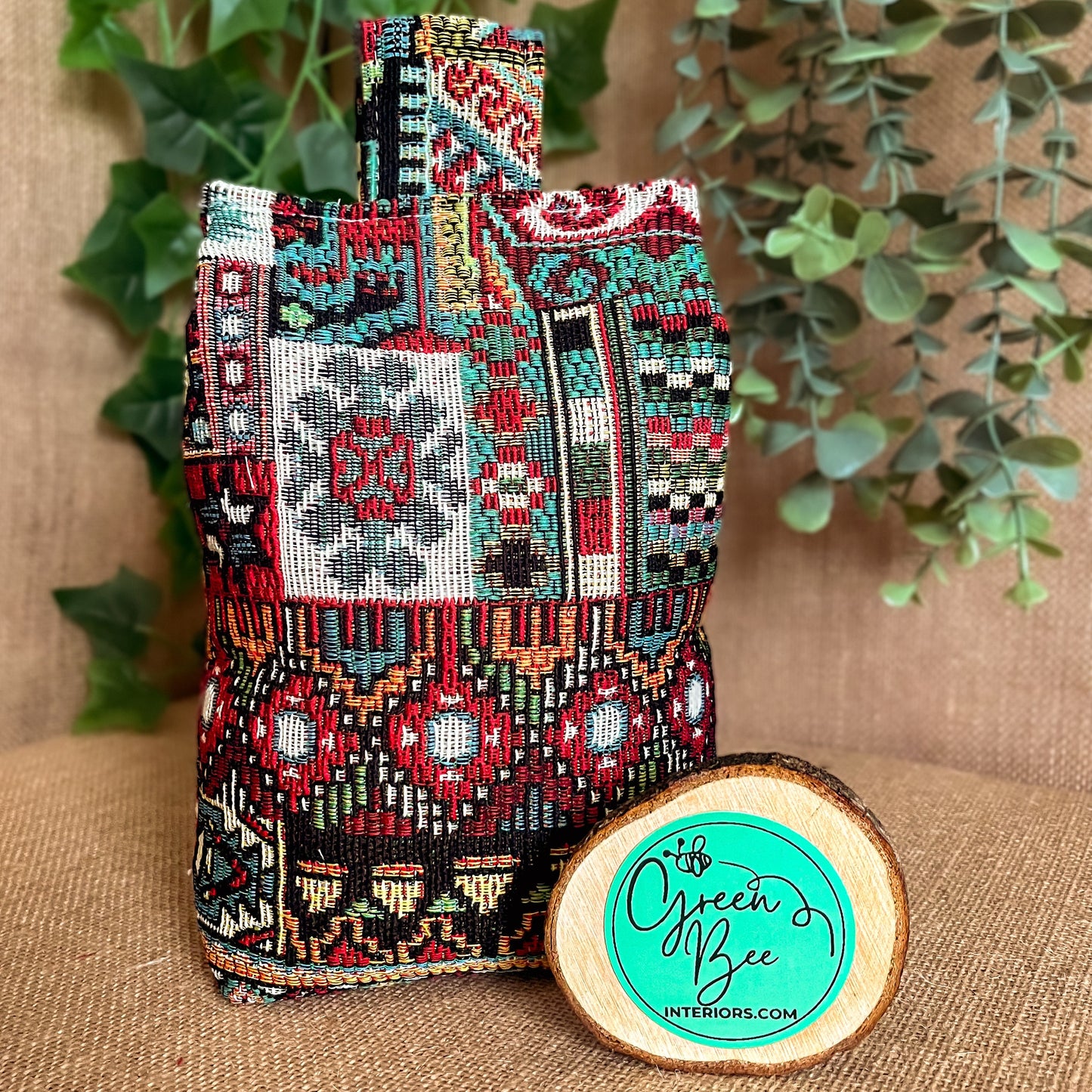 Handcrafted Moroccan-inspired wheat-filled door stop, crafted from durable woven tapestry fabric in vibrant red and blue rustic hues. Measures 22cm tall x 15cm x 7cm at the base