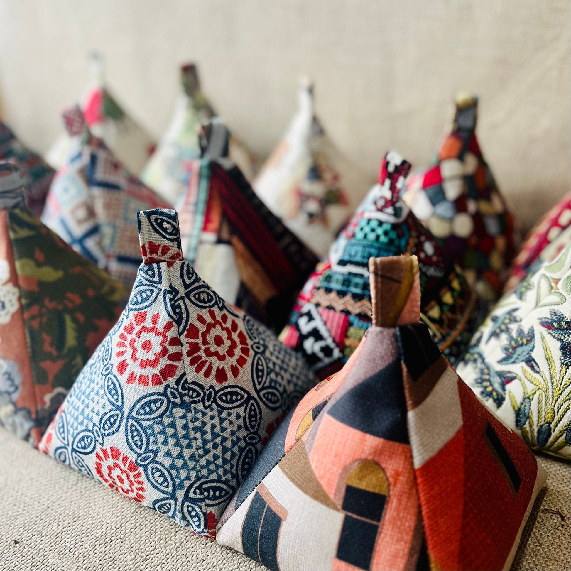Handcrafted large Farm House Style Eucalyptus print wheat-filled door stop. Crafted from neutral beige printed linen blend fabric. Measures 22cm tall x 15cm x 7cm at the base. Perfect gift available filled or with Velcro closing to fill at home.